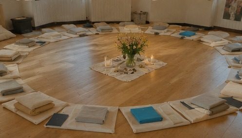 Cushions arranged in a circle in a group room